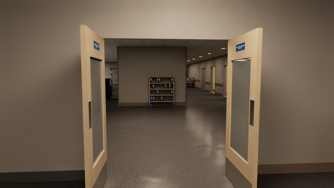 A pair of fire doors at the entrance to a hospital ward, held open